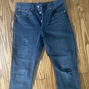 Levi’s 501 black distressed jean